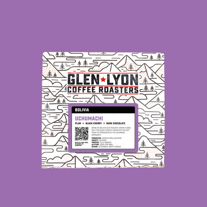 A 250g bag of Uchumachi from Glen Lyon Coffee Roasters coffee with a coloured purple background which matches the label.