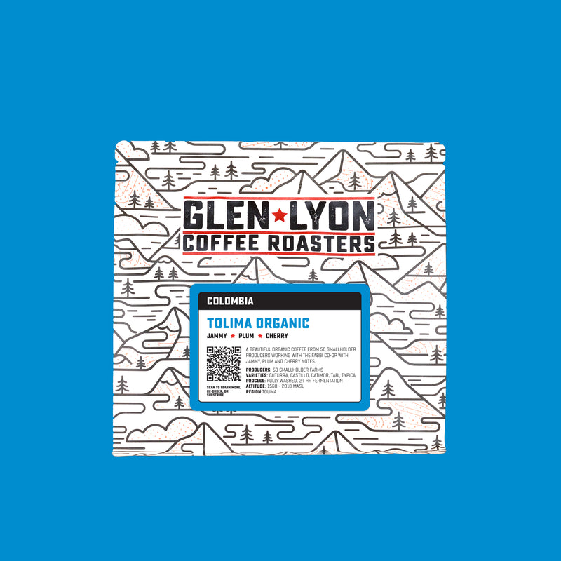 A 250g bag of Tolima Organic from Glen Lyon Coffee Roasters coffee with a coloured blue background which matches the label.