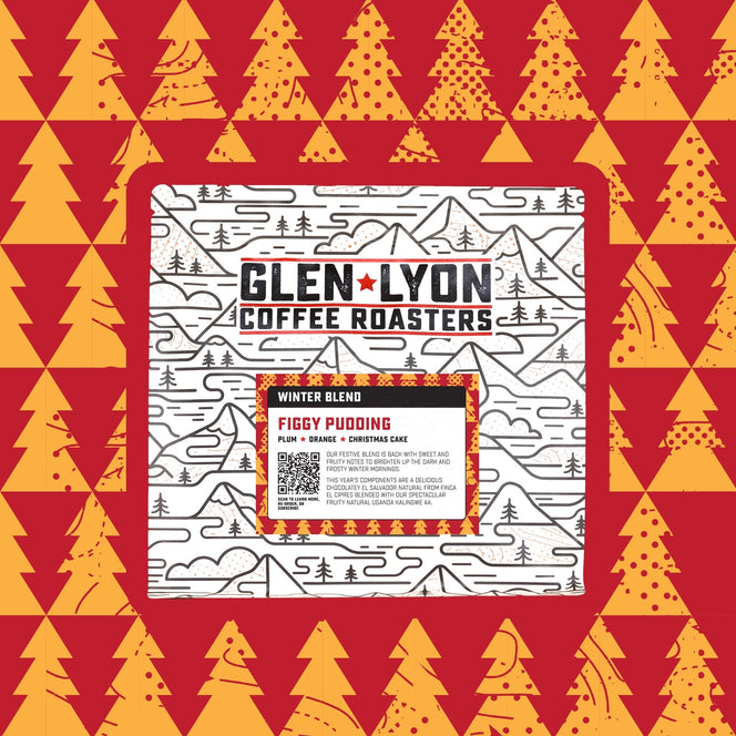 A 250g bag of Figgy Pudding from Glen Lyon Coffee Roasters coffee with a coloured orange background which matches the label.