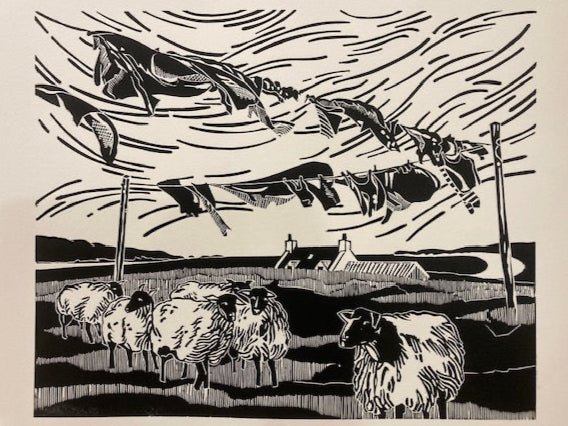 A black and white handcut lino print of sheep beneath blowing laundry on a line in a very clouded, windy landscape.