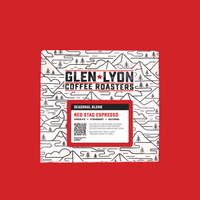 A 250g bag of Red Stag Espresso from Glen Lyon Coffee Roasters coffee with a red background which matches the label.