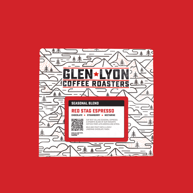 A 250g bag of Red Stag Espresso from Glen Lyon Coffee Roasters coffee with a red background which matches the label.