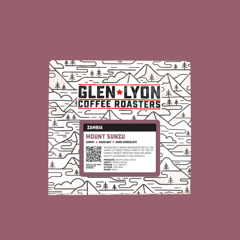 A 250g bag of Mount Sunzu from Glen Lyon Coffee Roasters coffee with a coloured purple background which matches the label.